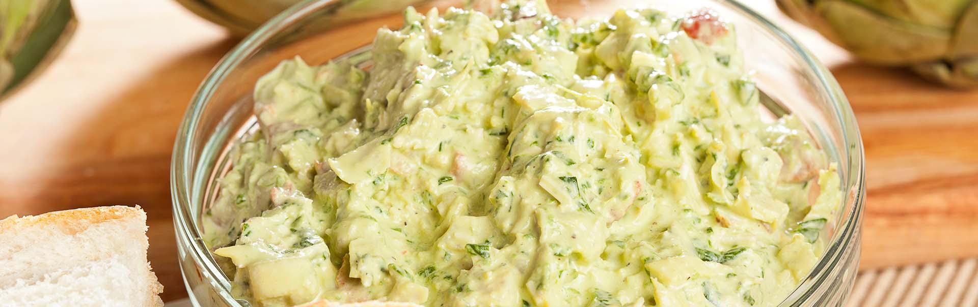 close up shot of a bowl of fresh dop and french bread